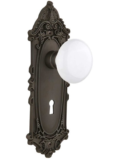 Largo Door Set with White Porcelain Knobs and Keyhole - 2 3/8 in Oil-Rubbed Bronze.